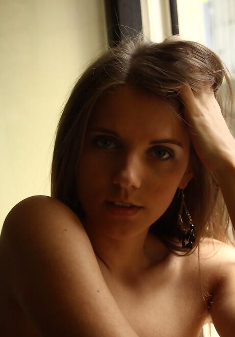 Shapely babe Kira in underwear shows small tits and spreads her legs 