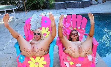 Sexy cuties Vanessa Cage and Riley Reid in bikini make some playful lesbian action outside